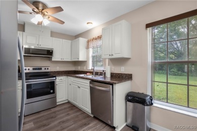 Beautifully remodeled 3-bedroom, 2-bath, 2-story end unit on LakeSide Country Club in Florida - for sale on GolfHomes.com, golf home, golf lot