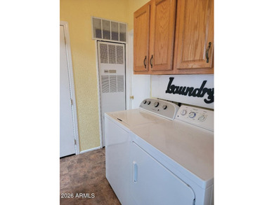 A beautiful 3 bedroom 2 bath home ., with Arizona room (not on 3 Parks Fairways in Arizona - for sale on GolfHomes.com, golf home, golf lot