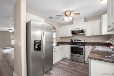 Beautifully remodeled 3-bedroom, 2-bath, 2-story end unit on LakeSide Country Club in Florida - for sale on GolfHomes.com, golf home, golf lot