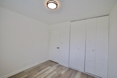 This is a 2 story end unit town home located in a quiet on Poplar Creek Country Club in Illinois - for sale on GolfHomes.com, golf home, golf lot