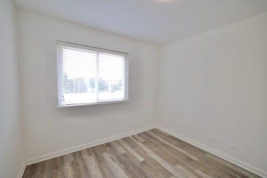 This is a 2 story end unit town home located in a quiet on Poplar Creek Country Club in Illinois - for sale on GolfHomes.com, golf home, golf lot