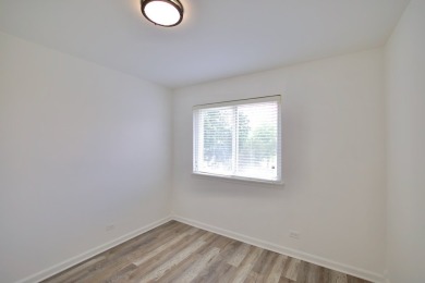 This is a 2 story end unit town home located in a quiet on Poplar Creek Country Club in Illinois - for sale on GolfHomes.com, golf home, golf lot