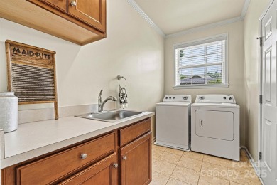 Custom-crafted by Bellamy Homes, this sprawling RANCH is a true on Cowans Ford Country Club in North Carolina - for sale on GolfHomes.com, golf home, golf lot