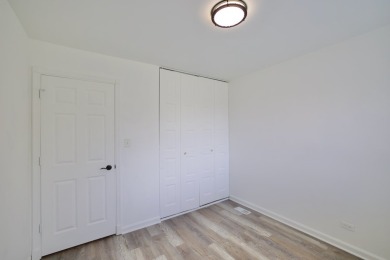 This is a 2 story end unit town home located in a quiet on Poplar Creek Country Club in Illinois - for sale on GolfHomes.com, golf home, golf lot