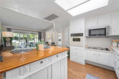 Welcome to this charming and unique 2-bedroom, 1.5-bath home in on Leisure World Seal Beach Golf Course in California - for sale on GolfHomes.com, golf home, golf lot