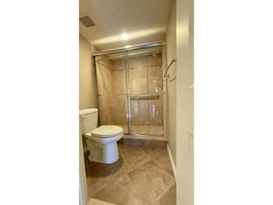 Experience the best of Jupiter living in this lovely affordable on The Golf Club of Jupiter in Florida - for sale on GolfHomes.com, golf home, golf lot