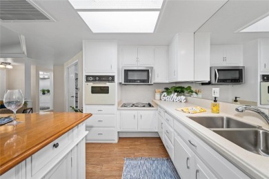 Welcome to this charming and unique 2-bedroom, 1.5-bath home in on Leisure World Seal Beach Golf Course in California - for sale on GolfHomes.com, golf home, golf lot