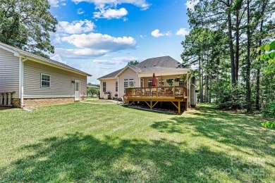 Custom-crafted by Bellamy Homes, this sprawling RANCH is a true on Cowans Ford Country Club in North Carolina - for sale on GolfHomes.com, golf home, golf lot