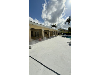 Experience the best of Jupiter living in this lovely affordable on The Golf Club of Jupiter in Florida - for sale on GolfHomes.com, golf home, golf lot