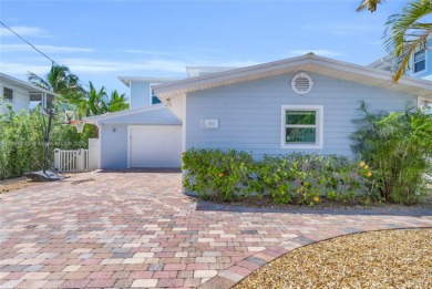 This Key Colony Beach coastal retreat blends modern elegance on Key Colony Beach Golf Course in Florida - for sale on GolfHomes.com, golf home, golf lot