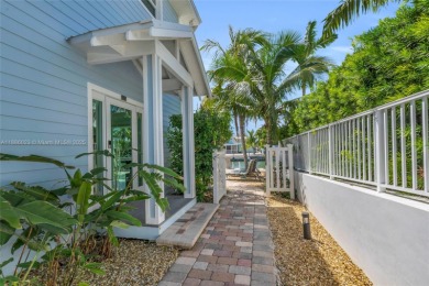 This Key Colony Beach coastal retreat blends modern elegance on Key Colony Beach Golf Course in Florida - for sale on GolfHomes.com, golf home, golf lot