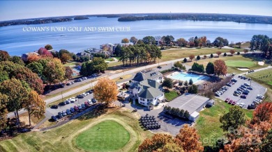 Custom-crafted by Bellamy Homes, this sprawling RANCH is a true on Cowans Ford Country Club in North Carolina - for sale on GolfHomes.com, golf home, golf lot