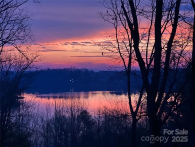 Nestled on 1.41 acres between 2 conservation areas, this on Marion Lake Club in North Carolina - for sale on GolfHomes.com, golf home, golf lot