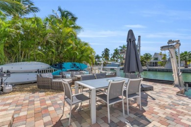This Key Colony Beach coastal retreat blends modern elegance on Key Colony Beach Golf Course in Florida - for sale on GolfHomes.com, golf home, golf lot