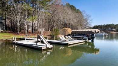 Set against the shimmering waters of Lake Oconee, this lakefront on Reynolds Lake Oconee - The Oconee in Georgia - for sale on GolfHomes.com, golf home, golf lot