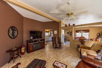 Beautifully furnished 3-bedroom, 2-bath home on a double lot on Foothills Executive Golf Course in Arizona - for sale on GolfHomes.com, golf home, golf lot