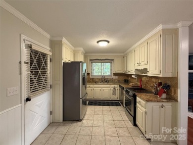 Updated Golf Course Home!This alluring 2,965 SF home is ideally on Marion Lake Club in North Carolina - for sale on GolfHomes.com, golf home, golf lot