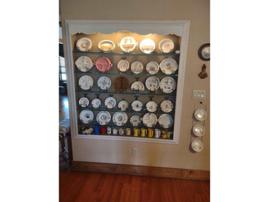 Custom 1.27 acre estate with soaring ceilings, sunroom fireplace on Nutcracker Golf Club in Texas - for sale on GolfHomes.com, golf home, golf lot