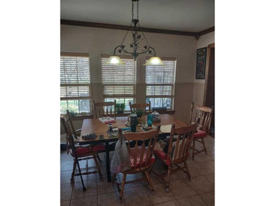 Custom 1.27 acre estate with soaring ceilings, sunroom fireplace on Nutcracker Golf Club in Texas - for sale on GolfHomes.com, golf home, golf lot