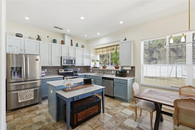 Beautifully updated 4BR/3BA custom home with a 3-car garage on The Grand Club - Pine Lakes Course in Florida - for sale on GolfHomes.com, golf home, golf lot