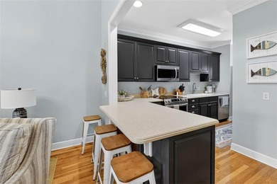 Experience easy coastal living at Golfside Villas inside the on Sapelo Hammock Golf Club in Georgia - for sale on GolfHomes.com, golf home, golf lot