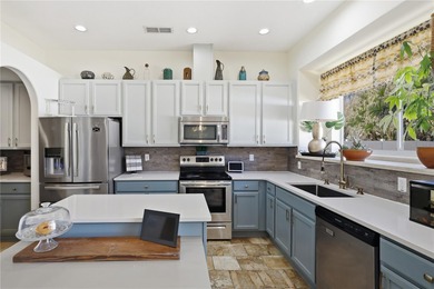 Beautifully updated 4BR/3BA custom home with a 3-car garage on The Grand Club - Pine Lakes Course in Florida - for sale on GolfHomes.com, golf home, golf lot