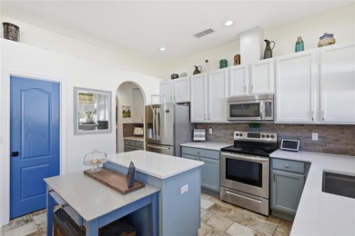 Beautifully updated 4BR/3BA custom home with a 3-car garage on The Grand Club - Pine Lakes Course in Florida - for sale on GolfHomes.com, golf home, golf lot