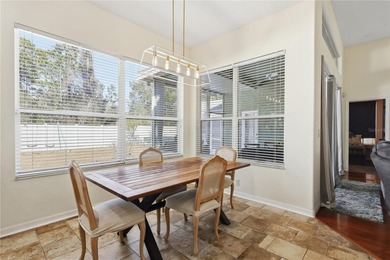 Beautifully updated 4BR/3BA custom home with a 3-car garage on The Grand Club - Pine Lakes Course in Florida - for sale on GolfHomes.com, golf home, golf lot