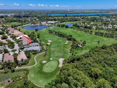 Set on a private cul-de-sac in the boutique Ironhorse community on Ironhorse Country Club in Florida - for sale on GolfHomes.com, golf home, golf lot
