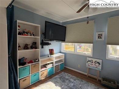 Walk to Golf and The Patio Grill from this nicely updated on Land Harbor Golf Course in North Carolina - for sale on GolfHomes.com, golf home, golf lot