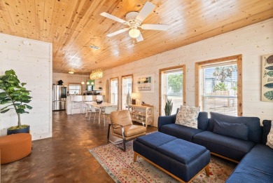 This end-unit, townhouse-style condo is perfectly located near on Palmilla Beach Golf Club in Texas - for sale on GolfHomes.com, golf home, golf lot