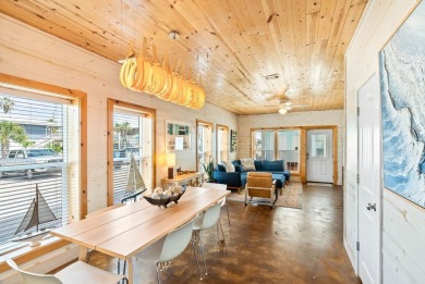 This end-unit, townhouse-style condo is perfectly located near on Palmilla Beach Golf Club in Texas - for sale on GolfHomes.com, golf home, golf lot