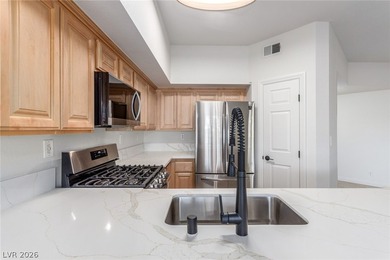 MOVE IN READY, FIRST FLOOR UNIT. Easy access to golf at Painted on Painted Desert Golf Club in Nevada - for sale on GolfHomes.com, golf home, golf lot