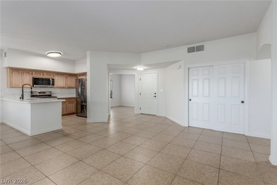 MOVE IN READY, FIRST FLOOR UNIT. Easy access to golf at Painted on Painted Desert Golf Club in Nevada - for sale on GolfHomes.com, golf home, golf lot