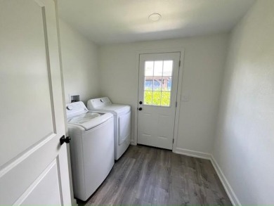 This beautifully renovated 3BED/2BATH open-concept home blends on Del Tura Golf and Country Club in Florida - for sale on GolfHomes.com, golf home, golf lot