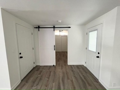 This beautifully renovated 3BED/2BATH open-concept home blends on Del Tura Golf and Country Club in Florida - for sale on GolfHomes.com, golf home, golf lot