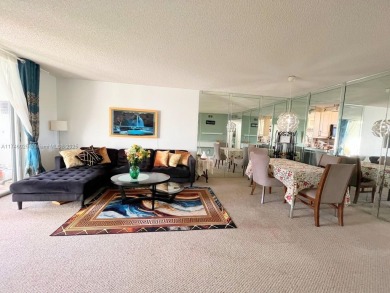 SPACIOUS 2 BEDROOM , 2 BATHROOM APARTMENT  OFFERS COMFORT AND on Oriole Golf and Tennis Club in Florida - for sale on GolfHomes.com, golf home, golf lot