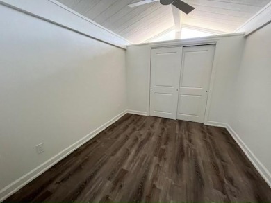 This beautifully renovated 3BED/2BATH open-concept home blends on Del Tura Golf and Country Club in Florida - for sale on GolfHomes.com, golf home, golf lot