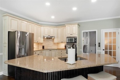 Welcome to this stunning brick entertainer's DREAM HOME in Towne on Towne Lake Hills Golf Club in Georgia - for sale on GolfHomes.com, golf home, golf lot