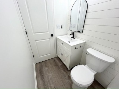 This beautifully renovated 3BED/2BATH open-concept home blends on Del Tura Golf and Country Club in Florida - for sale on GolfHomes.com, golf home, golf lot