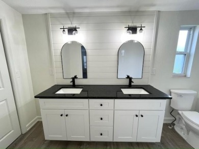 This beautifully renovated 3BED/2BATH open-concept home blends on Del Tura Golf and Country Club in Florida - for sale on GolfHomes.com, golf home, golf lot