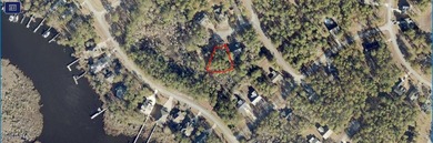 Wooded residential lot located on a quiet cul-de-sac within the on Harbour Point Golf Club in North Carolina - for sale on GolfHomes.com, golf home, golf lot