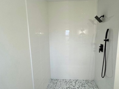 This beautifully renovated 3BED/2BATH open-concept home blends on Del Tura Golf and Country Club in Florida - for sale on GolfHomes.com, golf home, golf lot