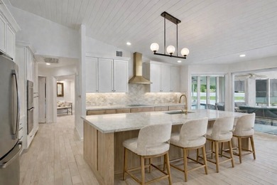 This stunning home was renovated to perfection. Amazing lake & on Stonebridge Golf and Country Club in Florida - for sale on GolfHomes.com, golf home, golf lot