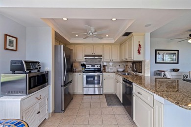 An abundance of natural light and updates in this welcoming on Isla Del Sol Yacht and Country Club in Florida - for sale on GolfHomes.com, golf home, golf lot