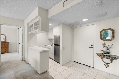 As you enter this end unit home you are greeted by stunning on  in California - for sale on GolfHomes.com, golf home, golf lot