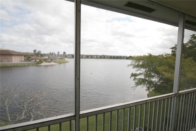 BEAUTIFUL LAKE VEW CONDO, RECENTHY PAINTED 1 BEDROOM 1 1/2 BATH on Flamingo Lakes Country Club in Florida - for sale on GolfHomes.com, golf home, golf lot