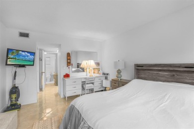 Welcome to this beautifully maintained first-floor condo with a on Cooper Colony Country Club in Florida - for sale on GolfHomes.com, golf home, golf lot