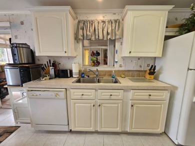 Located in a 55+ resort-style manufactured home community on on Big Cypress Golf and Country Club in Florida - for sale on GolfHomes.com, golf home, golf lot