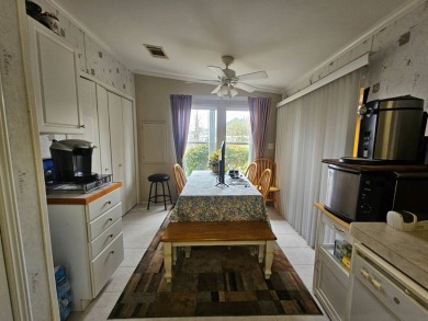 Located in a 55+ resort-style manufactured home community on on Big Cypress Golf and Country Club in Florida - for sale on GolfHomes.com, golf home, golf lot